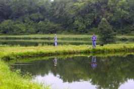 Two people fishing at Reed (James A) Memorial Wildlife Area