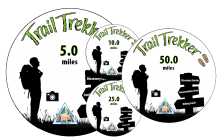 four Trail Trekker stickers showing different miles